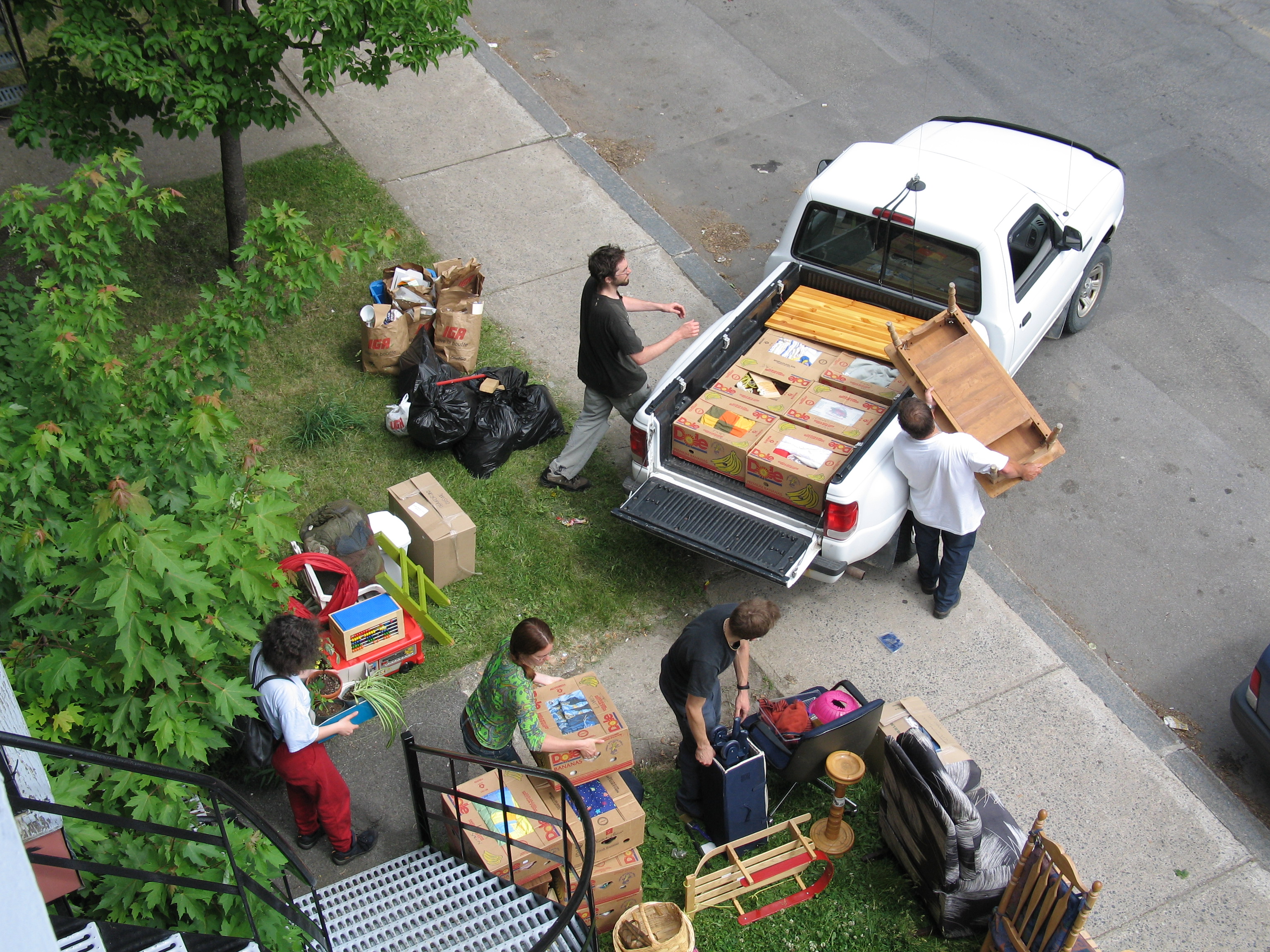 people packing truck