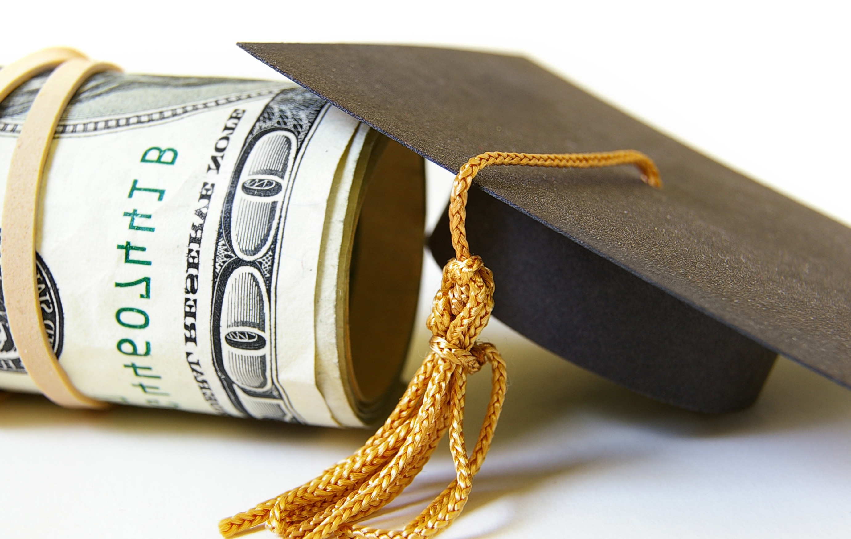 money and graduation hat